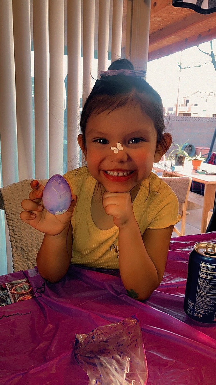 Allyana is registered to the contest to win money with this photo: chair, child, event, finger, fun, happy, joy, leisure, magenta, person, pink, purple, skin, smile, sweetness, t_shirt, table, tableware, thumb, toddler