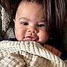 baby, blanket, face, smile, person, child, closeup, texture, cozy, warm, indoor, soft, expression, head, human, skin, lips, hair, portrait, comfort