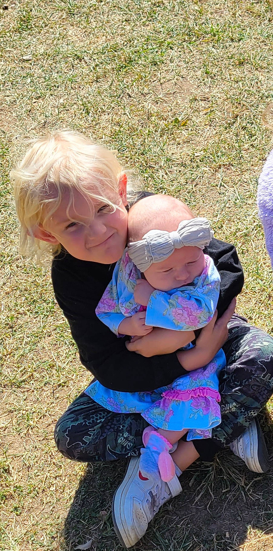 Calliope joined the competition — help win amazing prizes! baby, baby_toddler_clothing, child, event, eye, fun, grass, grass_family, happy, hat, joy, lawn, leisure, people_in_nature, person, pink, plant, recreation, sitting, summer