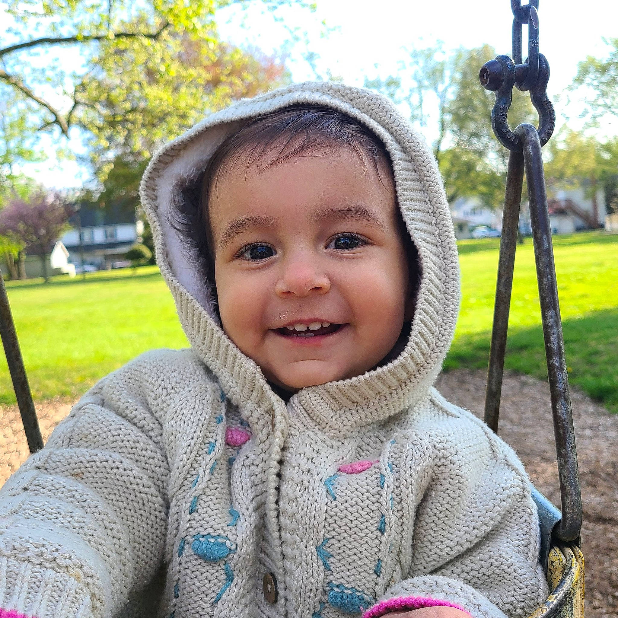 Salma joined the competition — help win amazing prizes! baby, baby_toddler_clothing, cheek, grass, happy, iris, joy, leaf, leisure, outerwear, people_in_nature, person, photograph, plant, recreation, skin, sky, smile, swing, toddler