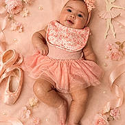 Vanessa is registered to the contest to win money with this photo: baby, child, infant, portrait, lying_down, smiling, pink, dress, tutu, headband, bow, floral, flowers, ballet_shoes, ribbons, pearls, blanket, studio_photography, adorable, pastel