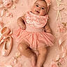 baby, child, infant, portrait, lying_down, smiling, pink, dress, tutu, headband, bow, floral, flowers, ballet_shoes, ribbons, pearls, blanket, studio_photography, adorable, pastel