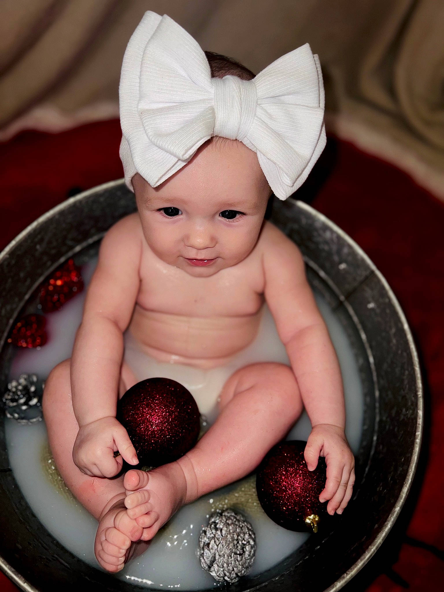 Braelynn is registered to the contest to win money with this photo: baby, baby_products, baby_toddler_clothing, cap, eye, finger, foot, happy, head, headwear, human_body, leg, lip, nail, person, pink, product, skin, thigh, thumb