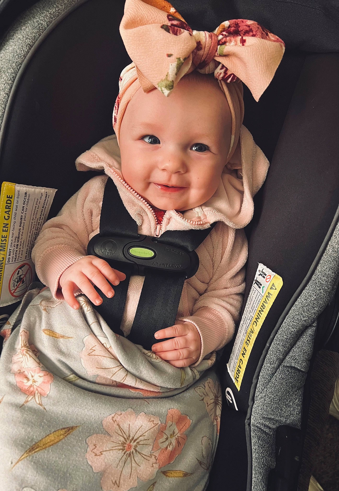 Braelynn is registered to the contest to win money with this photo: baby, baby_carriage, baby_products, baby_toddler_clothing, cheek, comfort, dress, fashion_accessory, fun, happy, headband, iris, joy, outerwear, person, product, sitting, skin, sleeve, smile