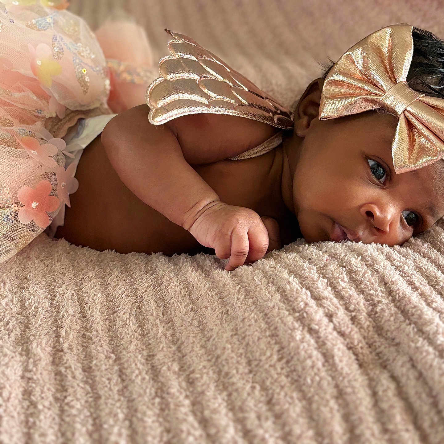 Zianna is registered to the contest to win money with this photo: baby, bed, blanket, bodypart, bonnet, clothing, crawling, face, finger, furniture, hand, happy, hat, head, newborn, person, photography, portrait, quilt, smile