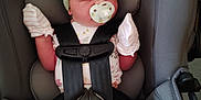 Sawyer joined the competition — help win amazing prizes! baby, infant, car_seat, pacifier, headband, bow, mittens, floral_clothing, safety_harness, child, cute, sleeping, newborn, pink, white, patterned_clothing, seat_belt, transportation, car, young_child