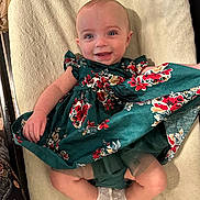 Sophia joined the competition — help win amazing prizes! baby, bed, blanket, clothing, couch, cushion, diaper, dress, face, furniture, happy, head, homedecor, newborn, person, photography, portrait, quilt, sitting, smile