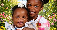 Chanelle is registered to the contest to win money with this photo: african_american, baby, butterflies, child, colorful_flowers, cute, family, flower_garden, greenery, happy, joy, nature, outdoor, playful, portrait, sisters, smiling, summer, sunlight, tiara
