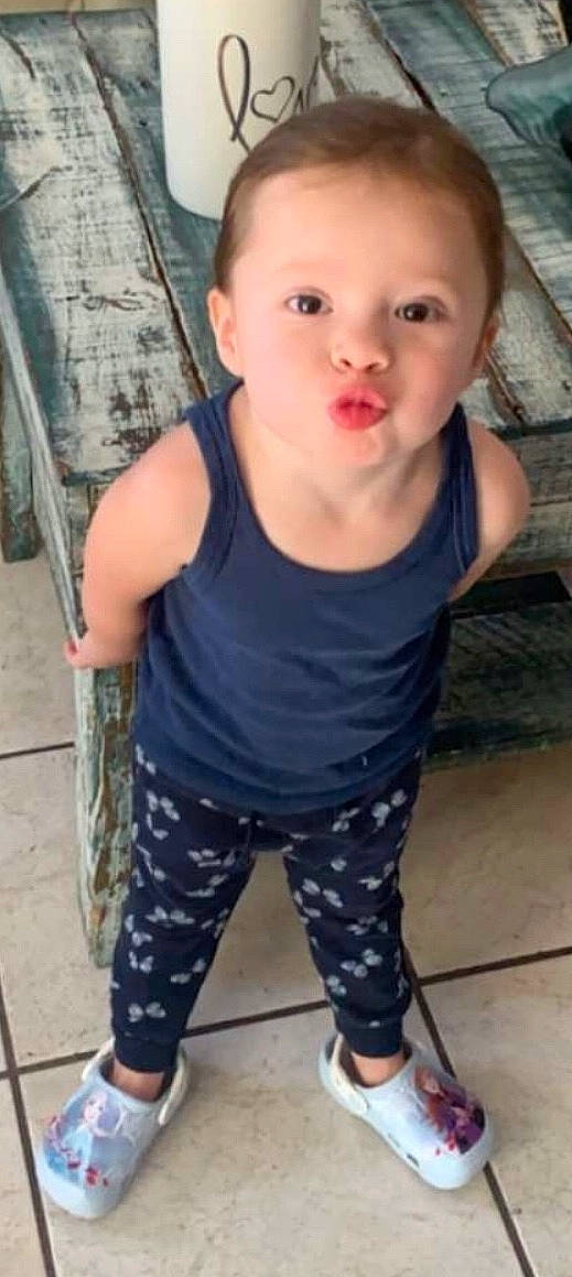 Jocelynn is registered to the contest to win money with this photo: arm, baby, cheek, child, child_model, jeans, leg, neck, nose, person, skin, sleeve, smile, sportswear, standing, t_shirt, thigh, toddler, trousers