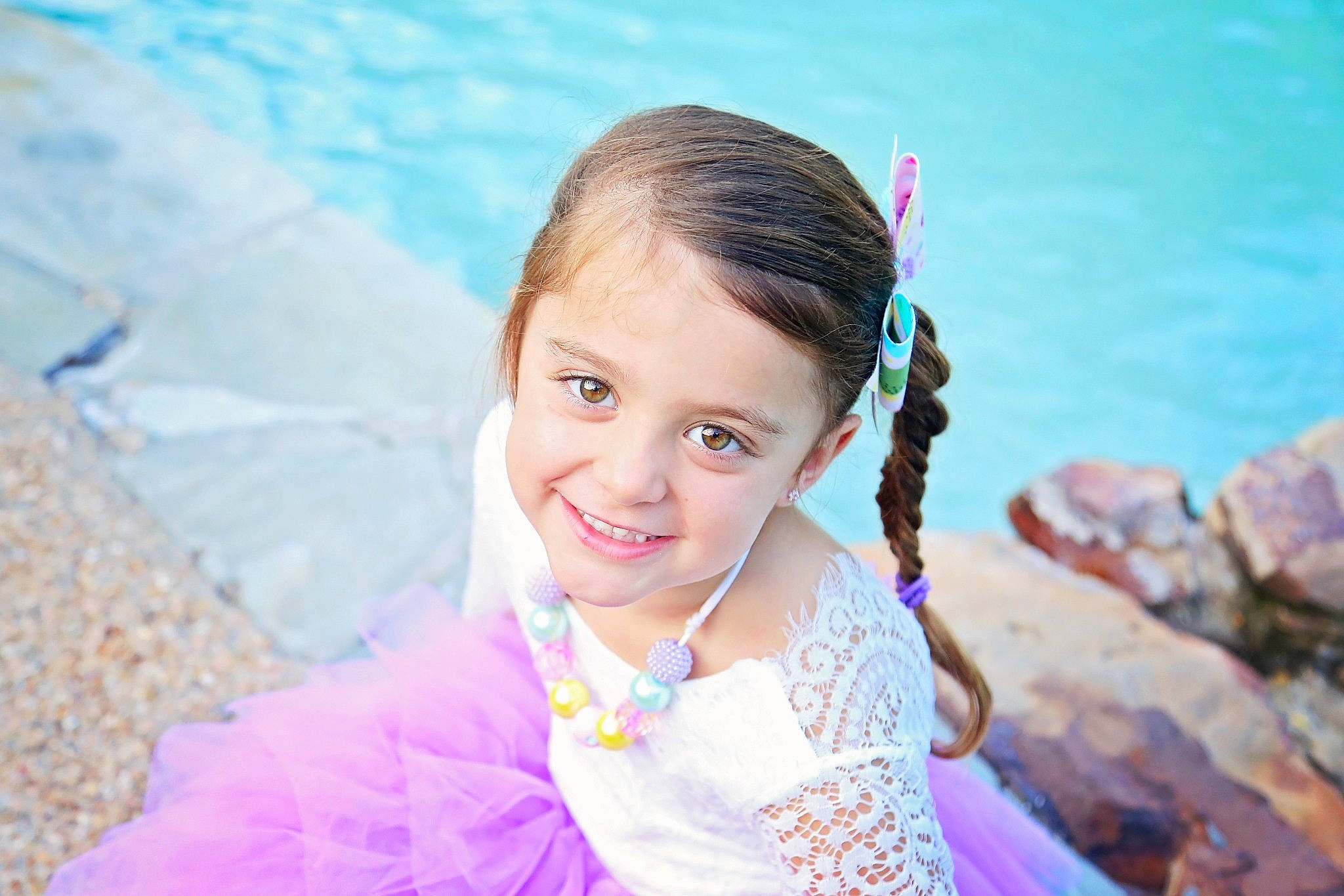 Maddox is registered to the contest to win money with this photo: child, child_model, fashion_accessory, fun, hair, hairstyle, happy, joy, person, photography, pigtail, skin, smile, summer, vacation