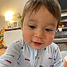 Ocean joined the competition — help win amazing prizes! toddler, child, pajamas, face, close_up, indoors, living_room, curious, cute, baby, person, smiling, young_child, clothing, home, furniture, toy, photography, warm_lighting, cozy