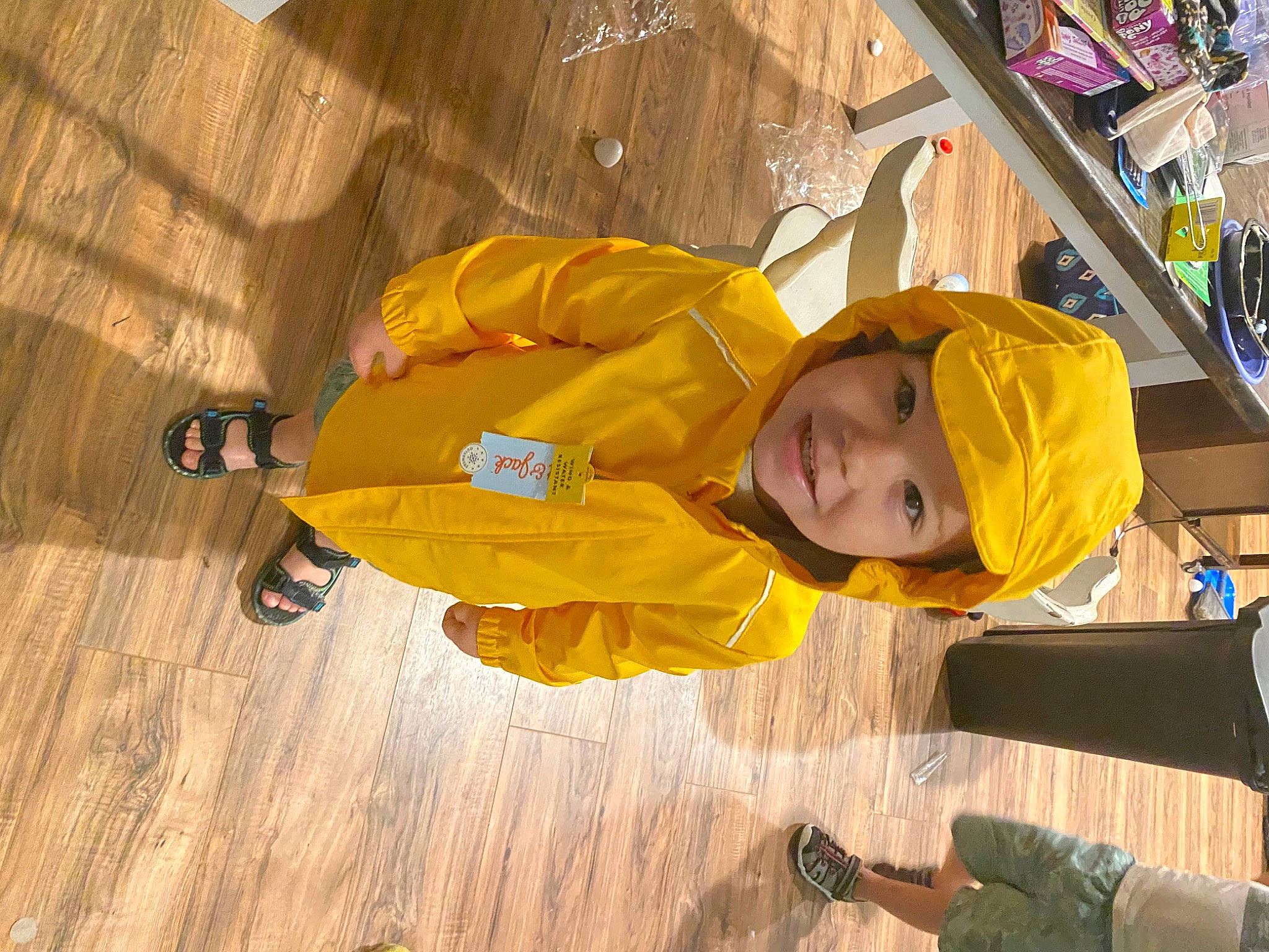 Callen joined the competition — help win amazing prizes! child, flooring, fun, hardwood, hat, headwear, joy, leisure, orange, outdoor_shoe, person, recreation, smile, tire, toddler, varnish, walking_shoe, wood, wood_flooring, wood_stain