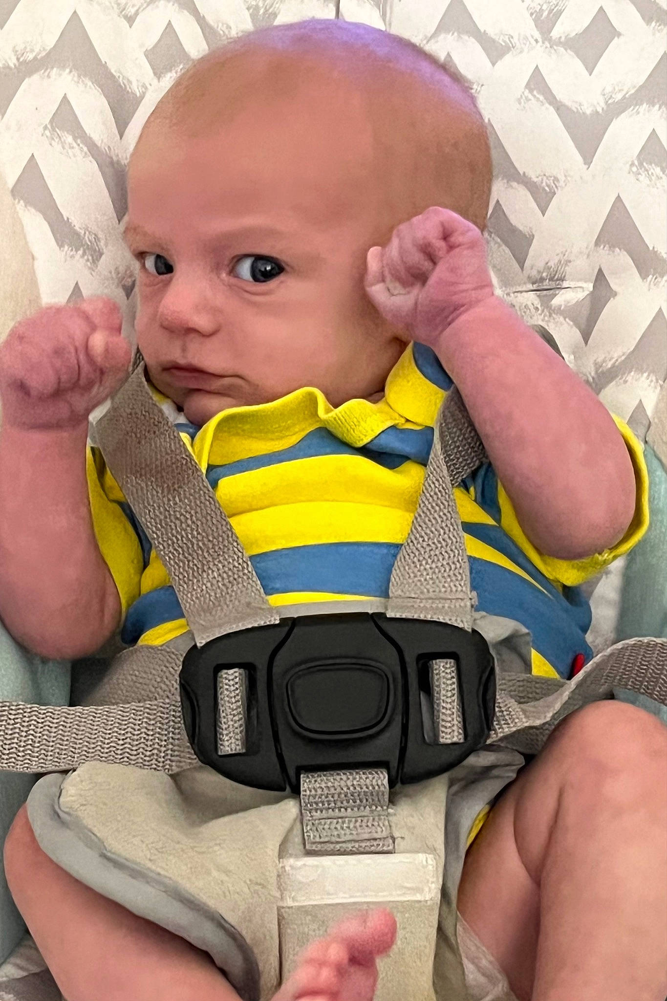 Aiden is registered to the contest to win money with this photo: baby, baby_carriage, baby_products, baby_safety, baby_toddler_clothing, chair, cheek, child, comfort, finger, hairstyle, neck, pattern, person, personal_protective_equipment, product, sitting, skin, thigh, thumb