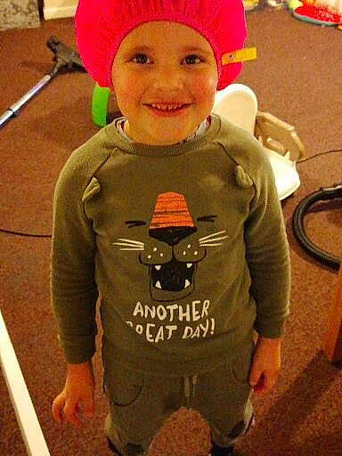 Amari joined the competition — help win amazing prizes! bicycle_wheel, cap, cool, costume_hat, fashion_accessory, flooring, happy, headgear, headwear, holiday, joy, outerwear, person, personal_protective_equipment, sleeve, smile, standing, t_shirt, textile, tire