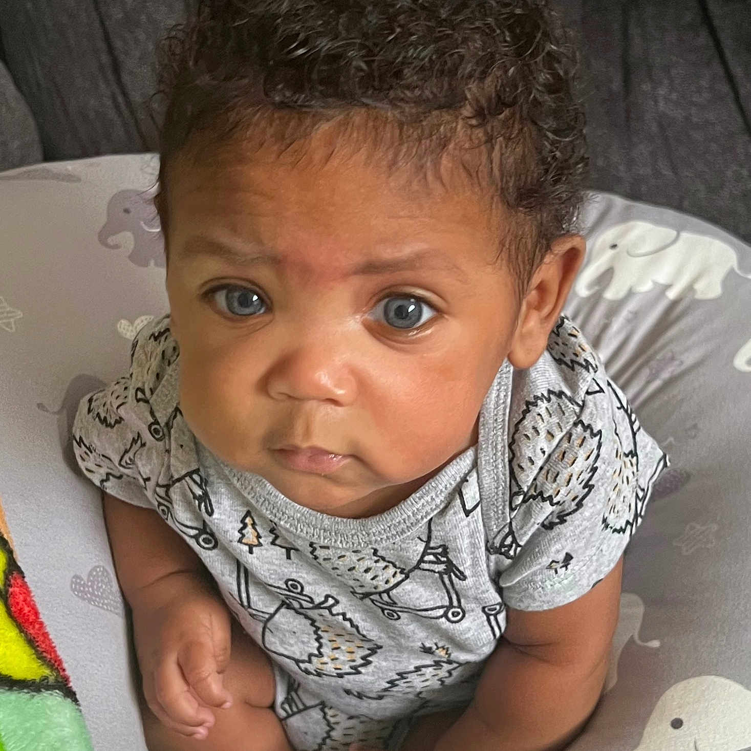 Raydin is registered to the contest to win money with this photo: baby, blackhair, clothing, crawling, face, frown, hair, happy, head, person, photography, portrait, sad, sleeve, smile