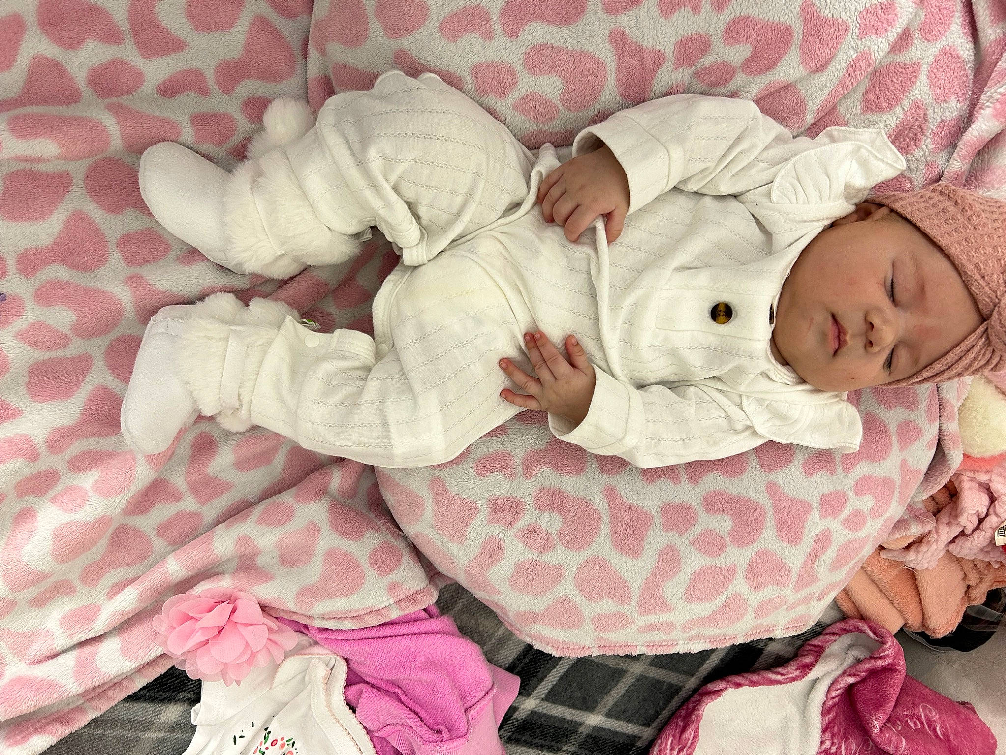 Yasely joined the competition — help win amazing prizes! baby, baby_products, baby_sleeping, baby_toddler_clothing, bedtime, carmine, child, comfort, hand, headwear, linens, nap, pattern, person, pink, plaid, room, sleep, sleeve, tartan