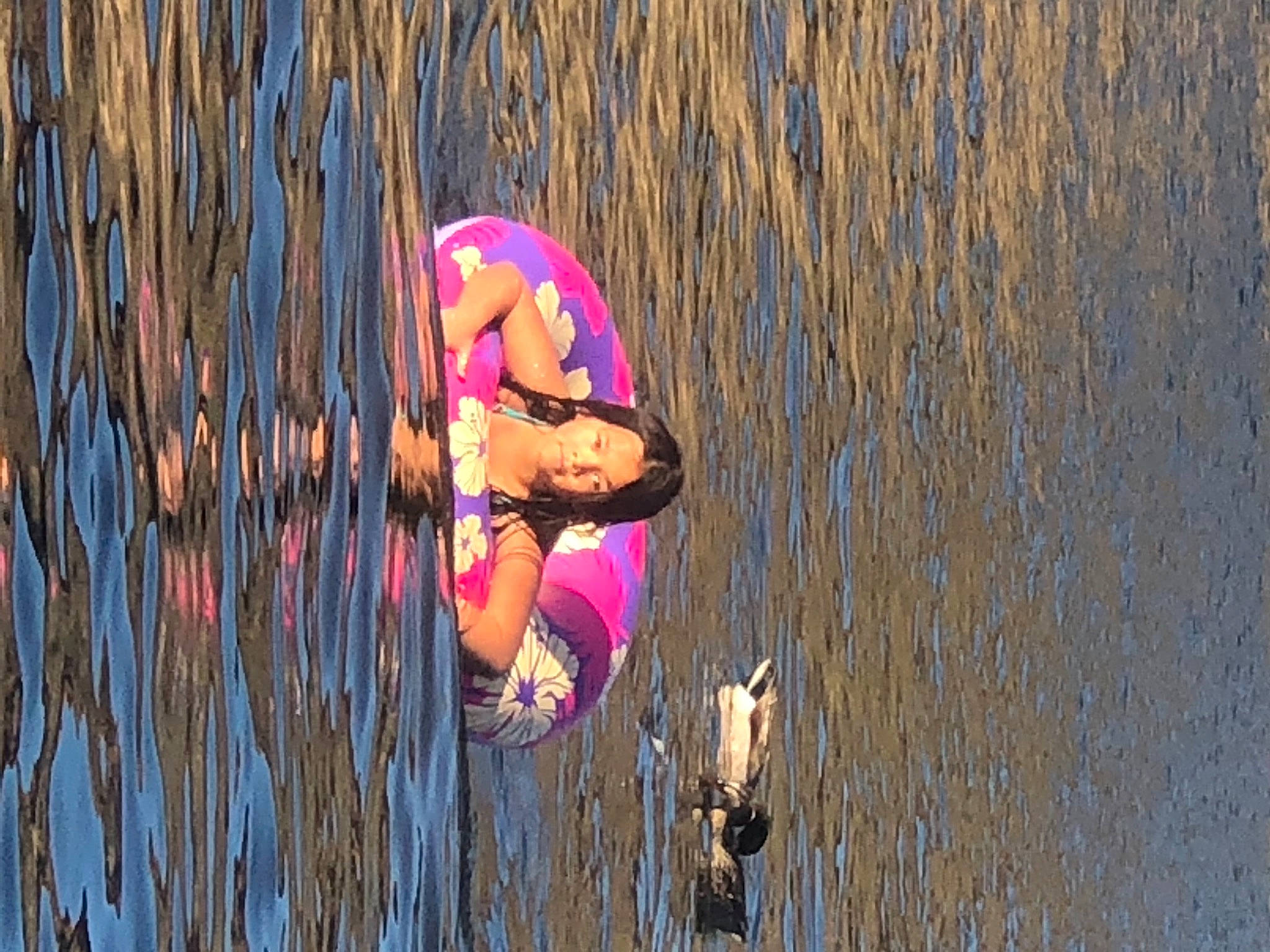 Aaliyah is registered to the contest to win money with this photo: boats_and_boating_equipment_and_supplies, body_of_water, elbow, flash_photography, fun, grass, grass_family, happy, hat, lake, leisure, people_in_nature, person, personal_protective_equipment, plant, recreation, reflection, sunglasses, tree, water