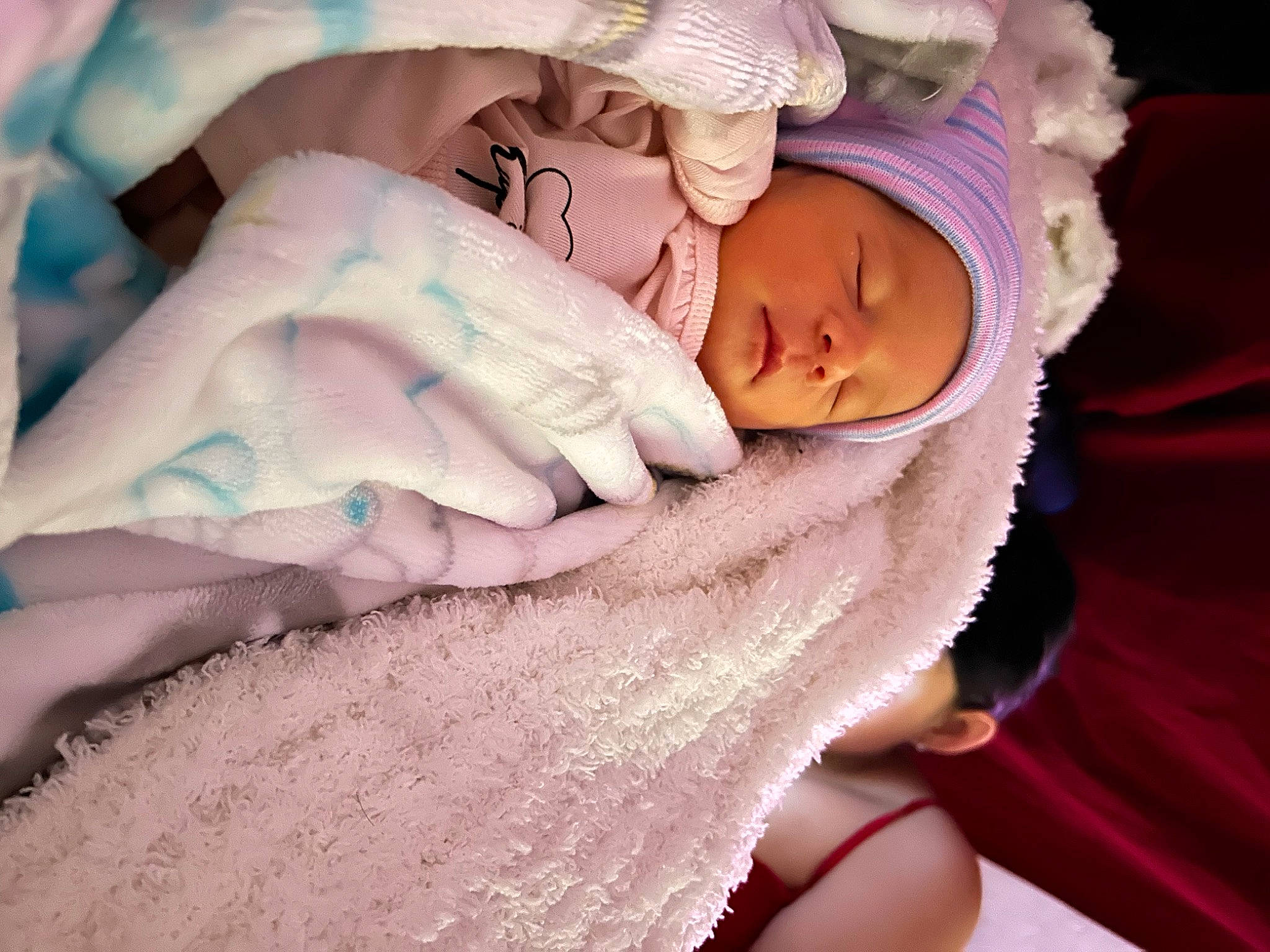 Yasely joined the competition — help win amazing prizes! arm, baby, baby_products, baby_sleeping, baby_toddler_clothing, bedtime, cheek, child, comfort, eye, hat, headgear, headwear, knit_cap, linens, magenta, nap, person, pink, room