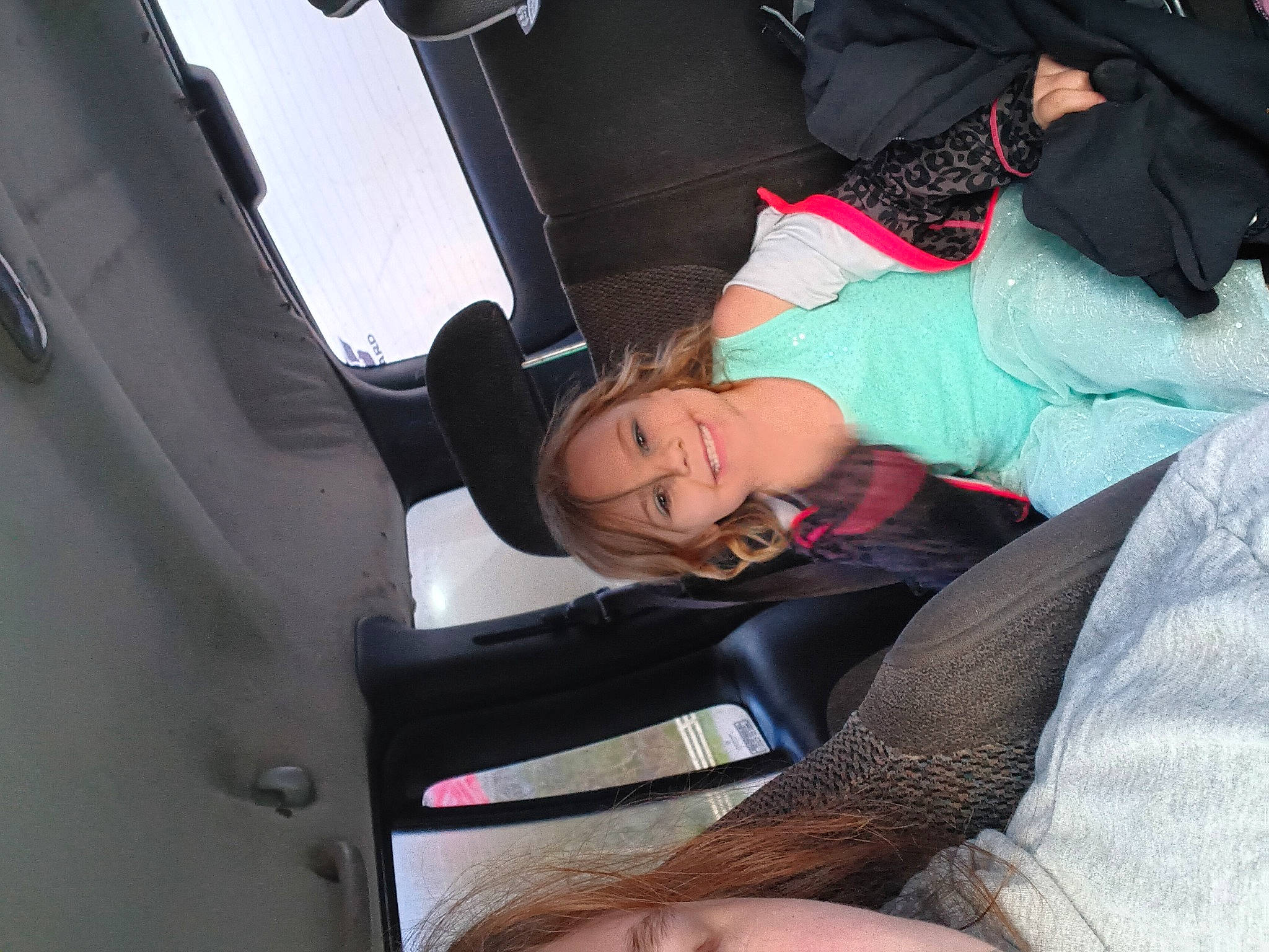 Kylie is registered to the contest to win money with this photo: auto_part, automotive_design, automotive_exterior, car_seat, car_seat_cover, comfort, family_car, fun, hand, head_restraint, human_leg, joy, knee, lap, luxury_vehicle, motor_vehicle, passenger, person, personal_luxury_car, seat_belt