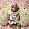 Lavaeh joined the competition — help win amazing prizes! baby, infant, child, hello_kitty, headband, pink_clothing, skirt, pillow, fluffy, carpet, soft_texture, cute, portrait, indoors, person, smiling, sitting, colorful, patterned_clothing, head