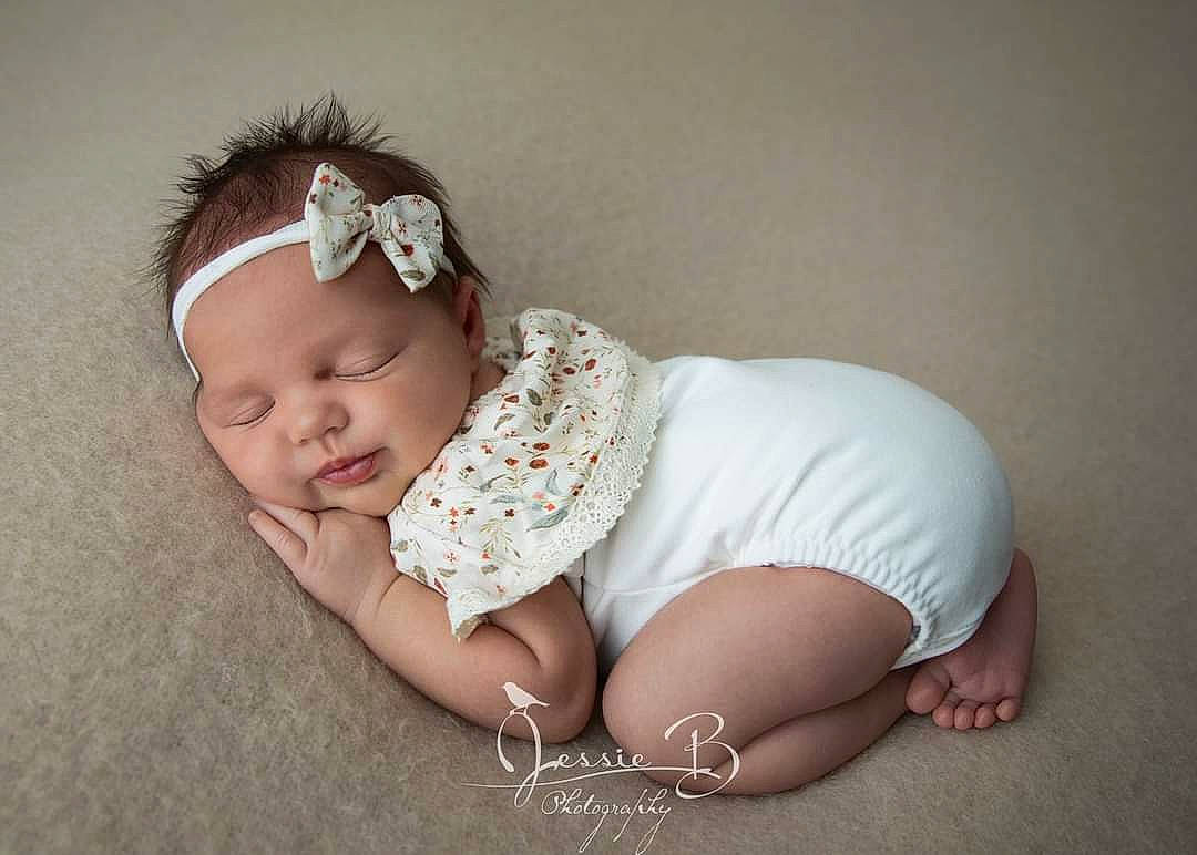 Harley joined the competition — help win amazing prizes! baby, baby_bloomers, baby_sleeping, baby_toddler_clothing, cheek, child, fashion_accessory, fur, hair_accessory, hand, headband, headgear, headpiece, headwear, person, photograph, photography, pink, skin, toddler