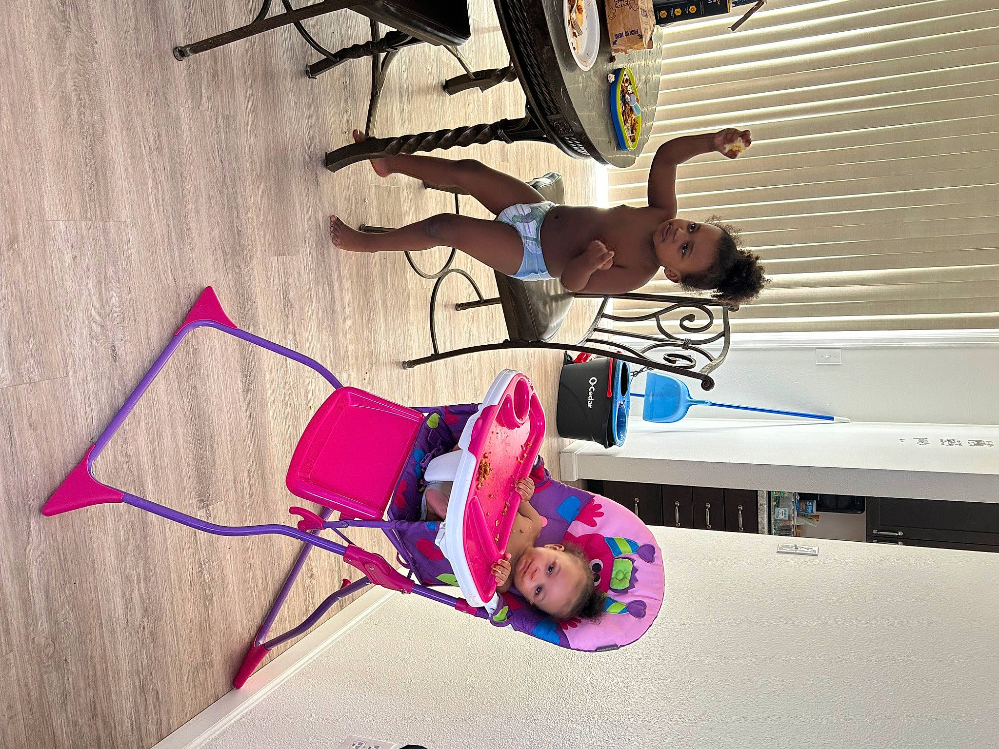 Ezekiel is registered to the contest to win money with this photo: art, flooring, font, fun, happy, hardwood, leisure, magenta, person, recreation, room, smile, thigh, visual_arts, wood