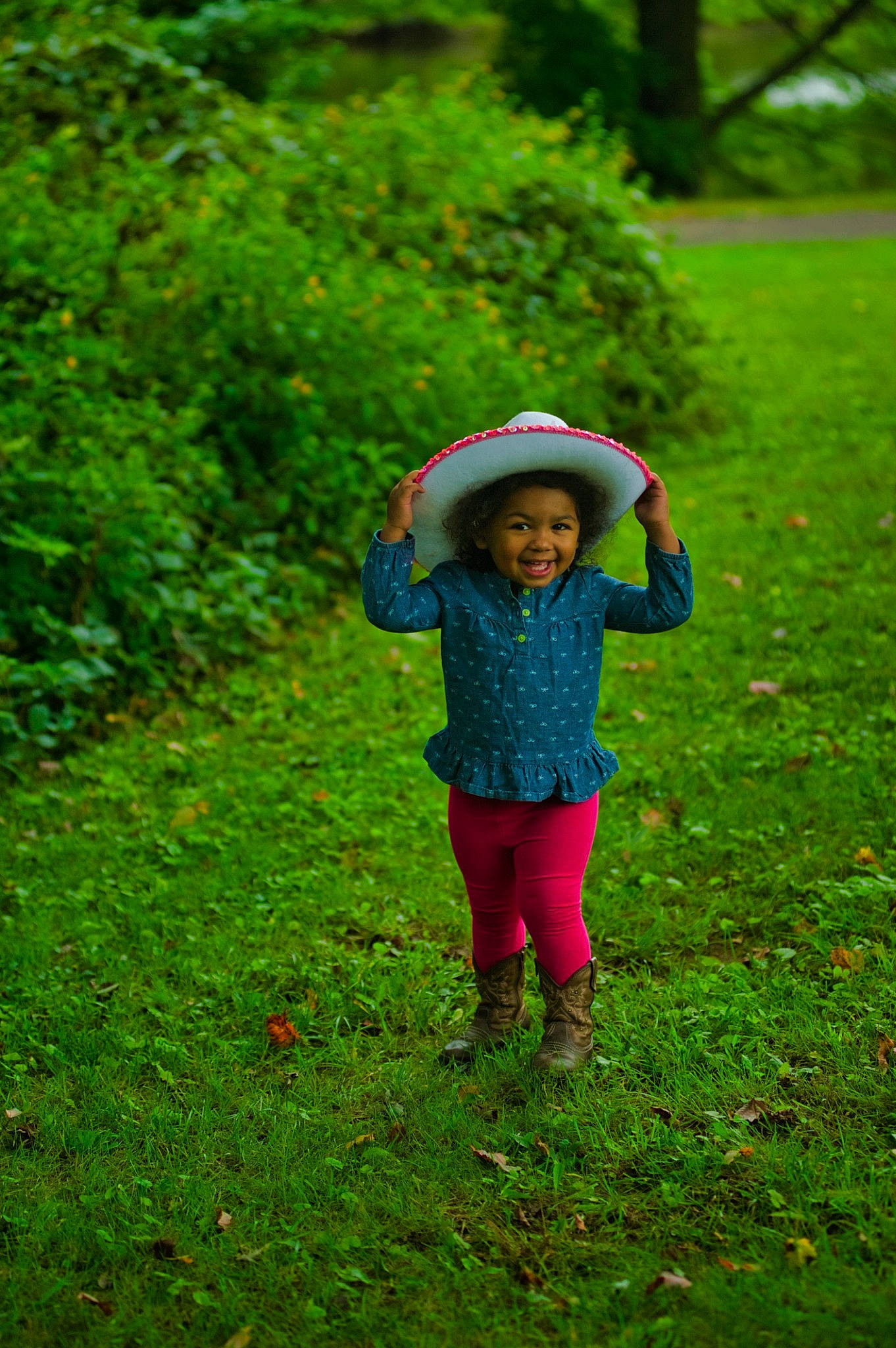 Sophia is registered to the contest to win money with this photo: child, emotion, facial_expression, field, fun, garden, girl, grass, green, joy, lawn, leaf, meadow, nature, person, plant, play, red, smile, tree