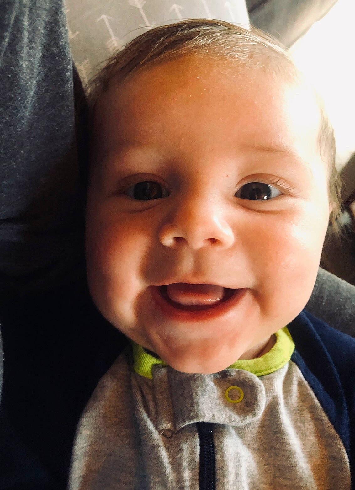 Everett is registered to the contest to win money with this photo: baby, cheek, child, chin, close_up, cool, eye, eyebrow, face, facial_expression, forehead, happy, head, joy, lip, mouth, nose, organ, person, skin