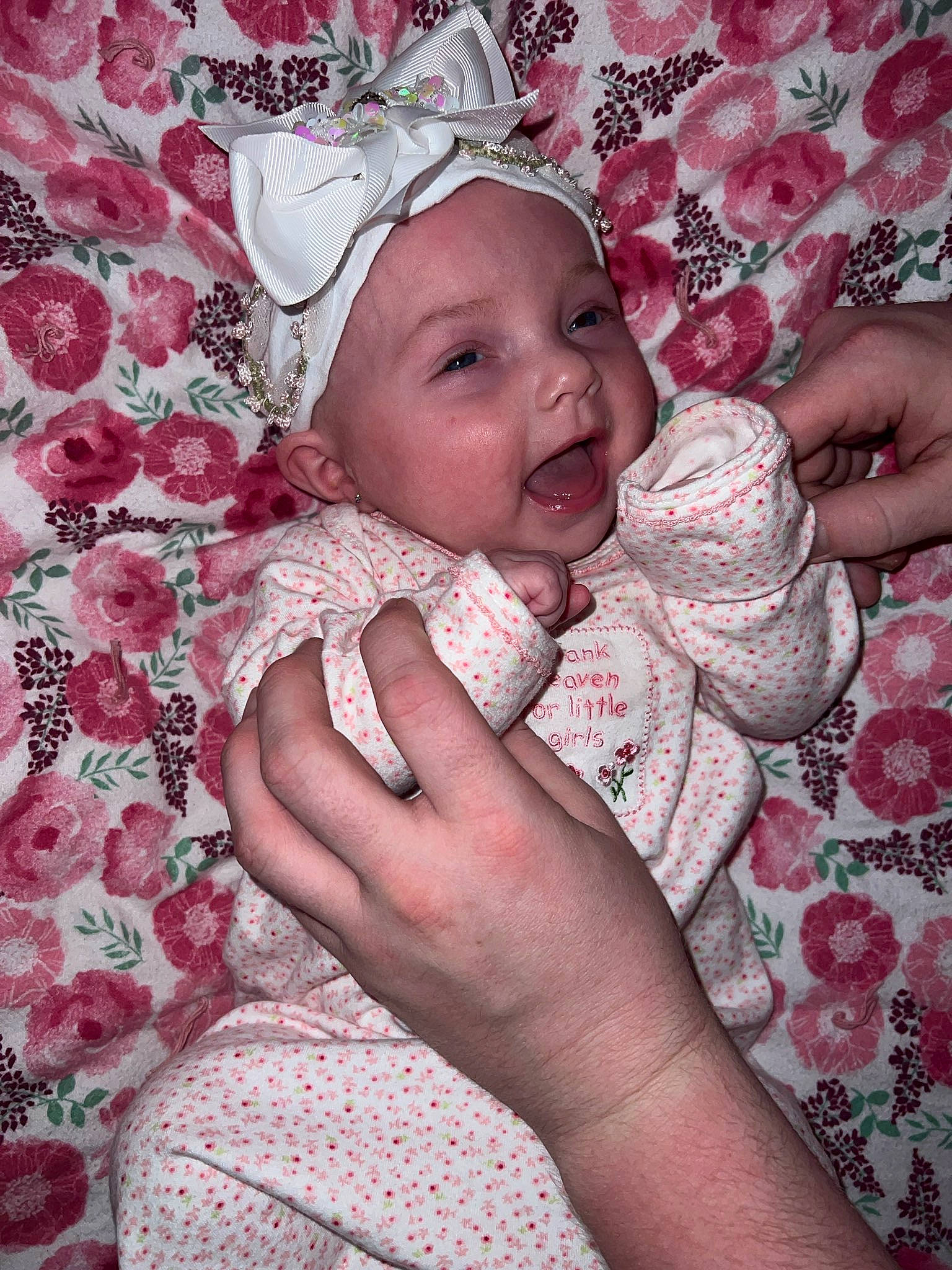 Noelle joined the competition — help win amazing prizes! baby, baby_sleeping, baby_toddler_clothing, cheek, comfort, finger, gesture, hand, happy, headpiece, headwear, linens, lip, nail, pattern, people_in_nature, person, petal, pink, skin