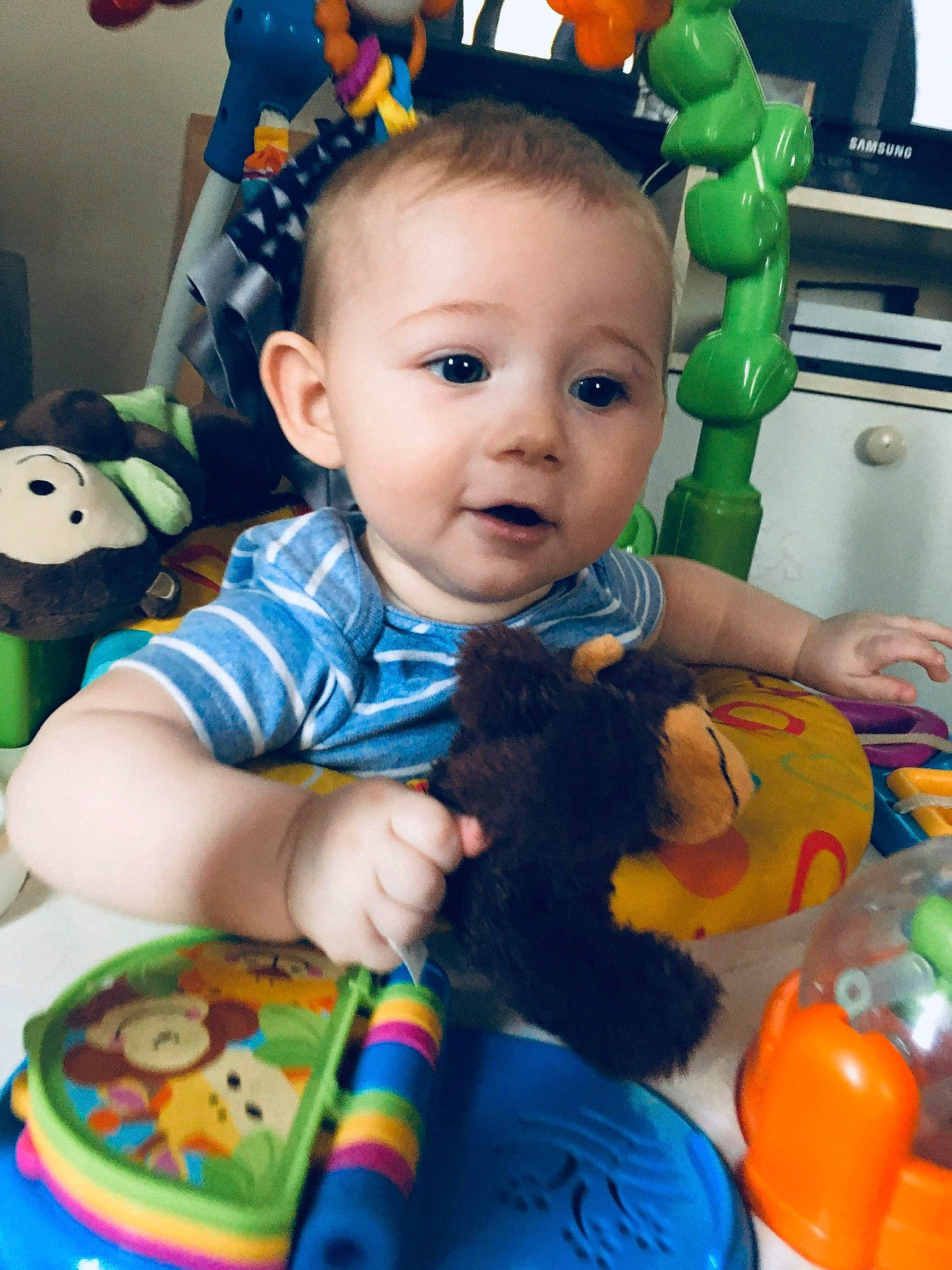 Colton joined the competition — help win amazing prizes! baby, baby_playing_with_toys, baby_products, baby_toys, cheek, child, ear, face, fun, happy, head, nose, person, play, product, skin, stuffed_toy, toddler, toy, tummy_time
