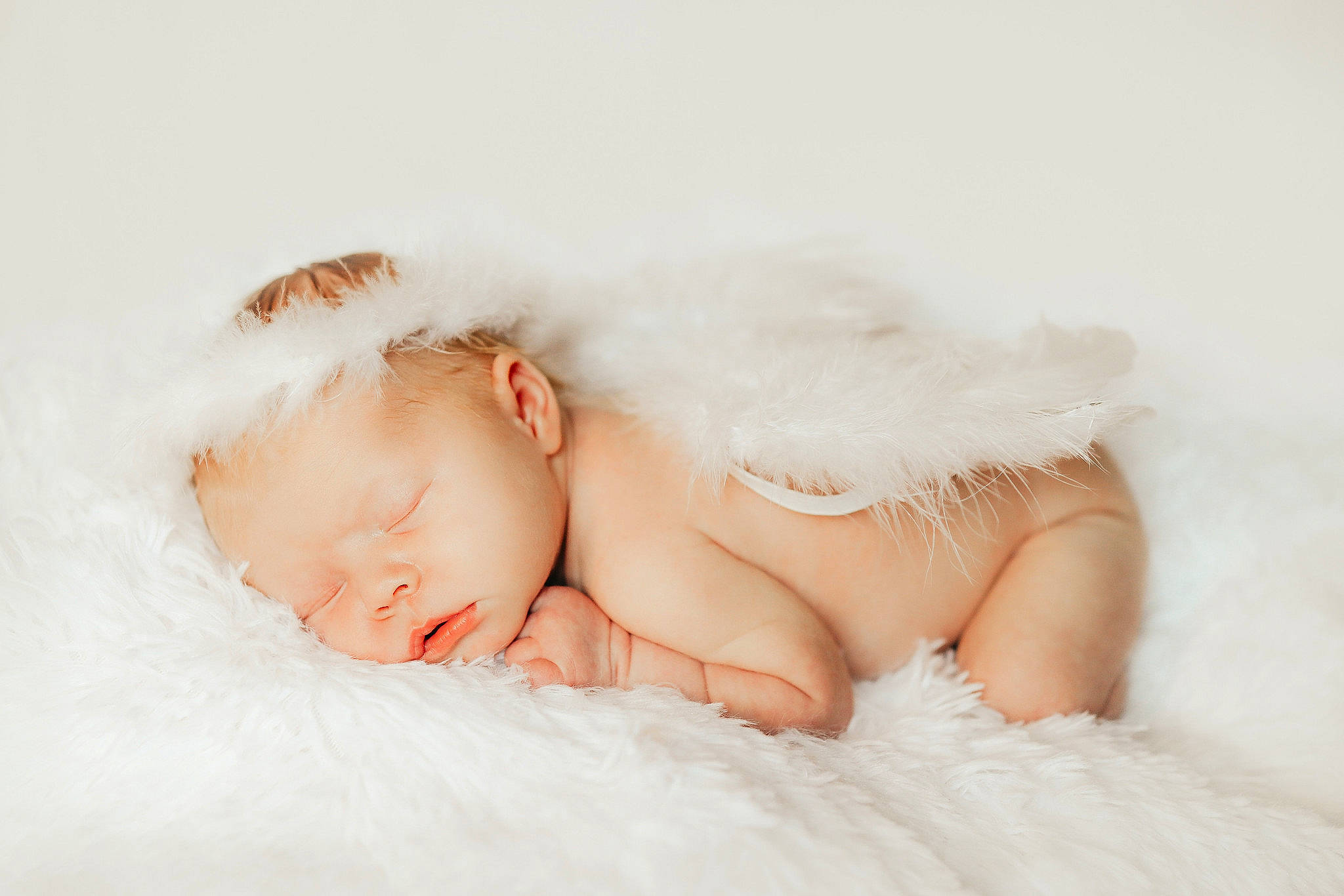 Madilynn is registered to the contest to win money with this photo: baby, baby_sleeping, baby_toddler_clothing, bedtime, cap, comfort, dress, face, fashion_accessory, flash_photography, fur, grass, hand, happy, headgear, headpiece, iris, linens, lip, person