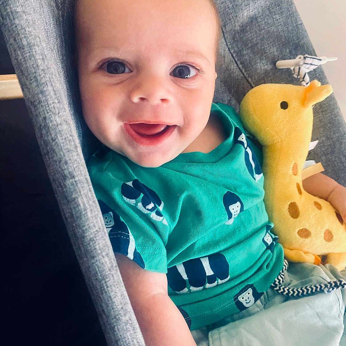 Knox joined the competition — help win amazing prizes! accessories, baby, babylaughing, chair, clothing, couch, cushion, face, furniture, happy, head, homedecor, jewelry, laughing, necklace, pants, person, photography, portrait, shirt