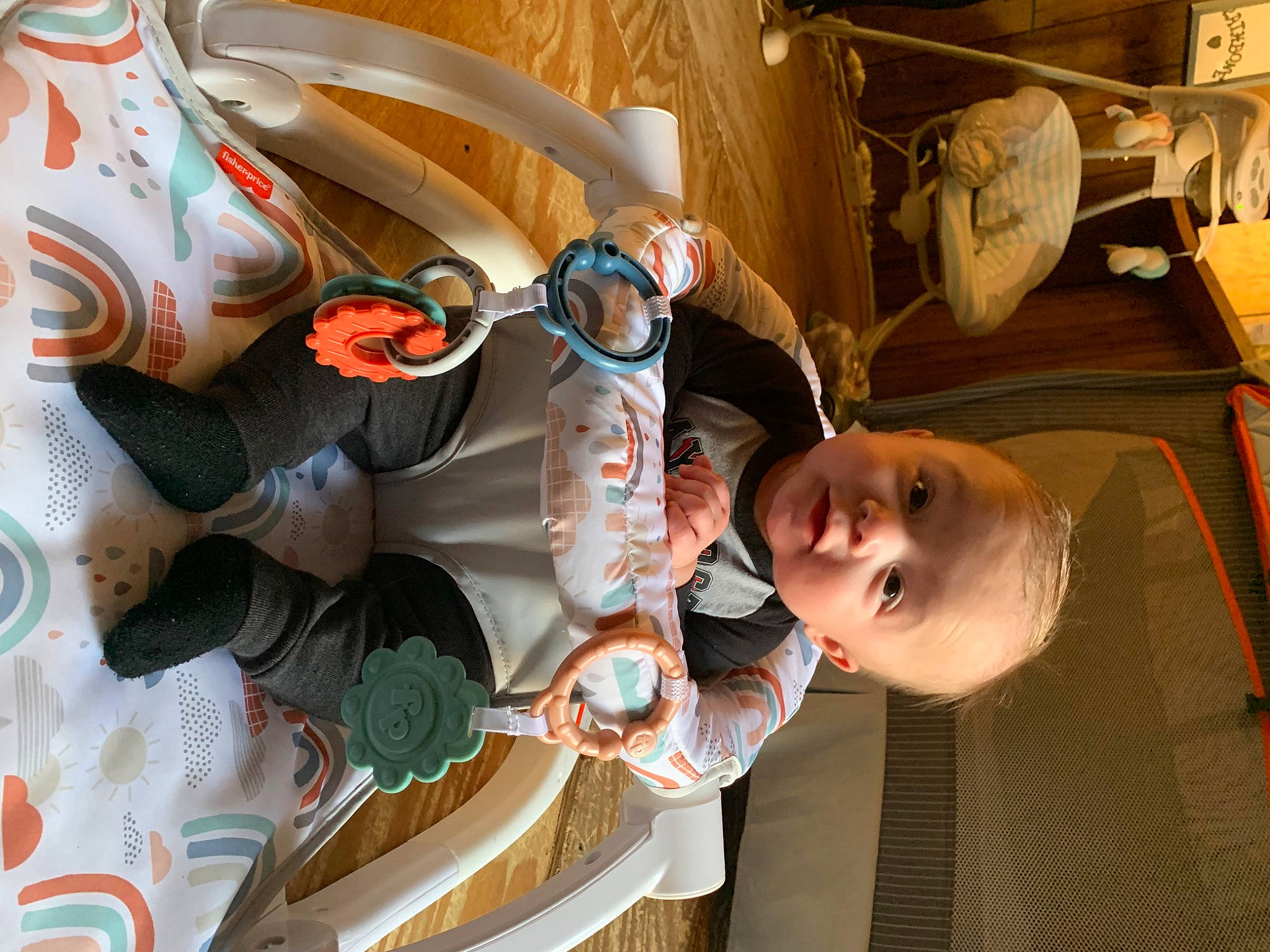 Joshua is registered to the contest to win money with this photo: baby, baby_products, child, eyewear, fun, hairstyle, happy, mouth, person, room, smile, toddler, vacation, wood