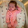 Sage joined the competition — help win amazing prizes! baby, sleeping, pink_onesie, patterned_cushion, arrows, infant, bottle, blanket, cozy, indoors, face, child, resting, cute, soft_lighting, newborn, bedtime, comfort, peaceful, portrait
