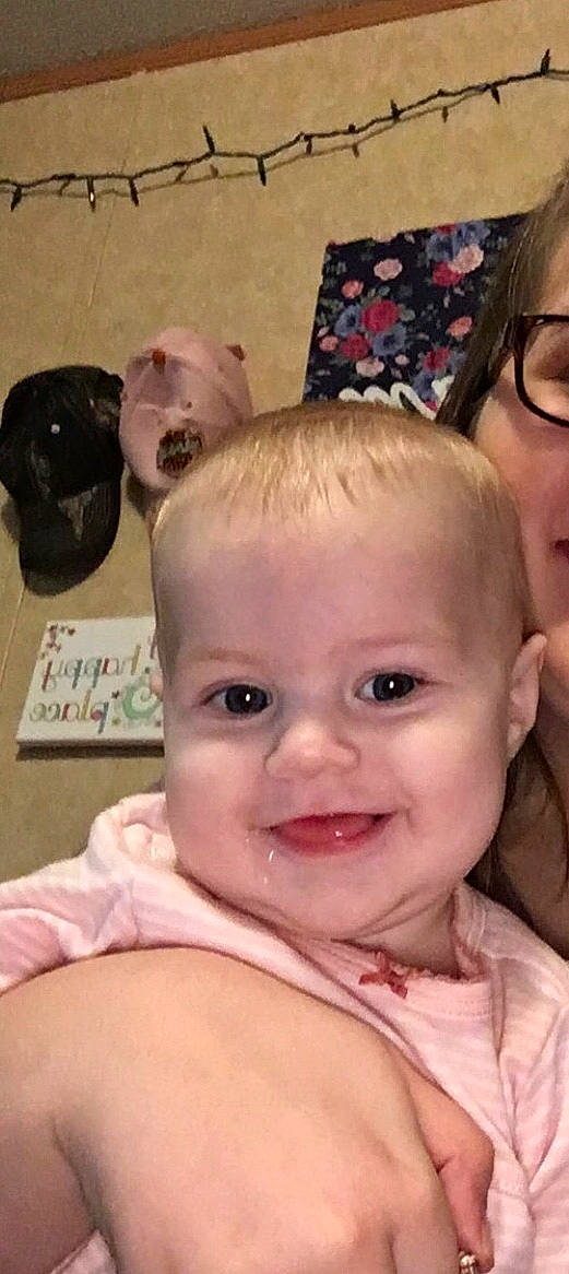 Annabelle is registered to the contest to win money with this photo: baby, cheek, child, ear, eye, eyebrow, face, facial_expression, forehead, head, iris, joy, lip, mouth, neck, nose, person, pink, skin, smile