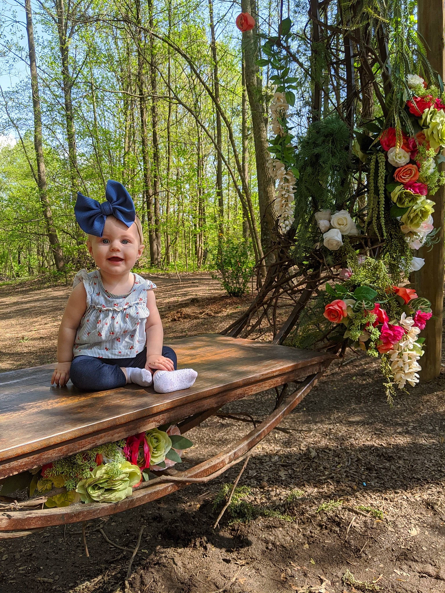 Annabelle is registered to the contest to win money with this photo: botany, child, flower, forest, headwear, joy, leisure, person, plant, spring, tree, vacation, wood, woodland
