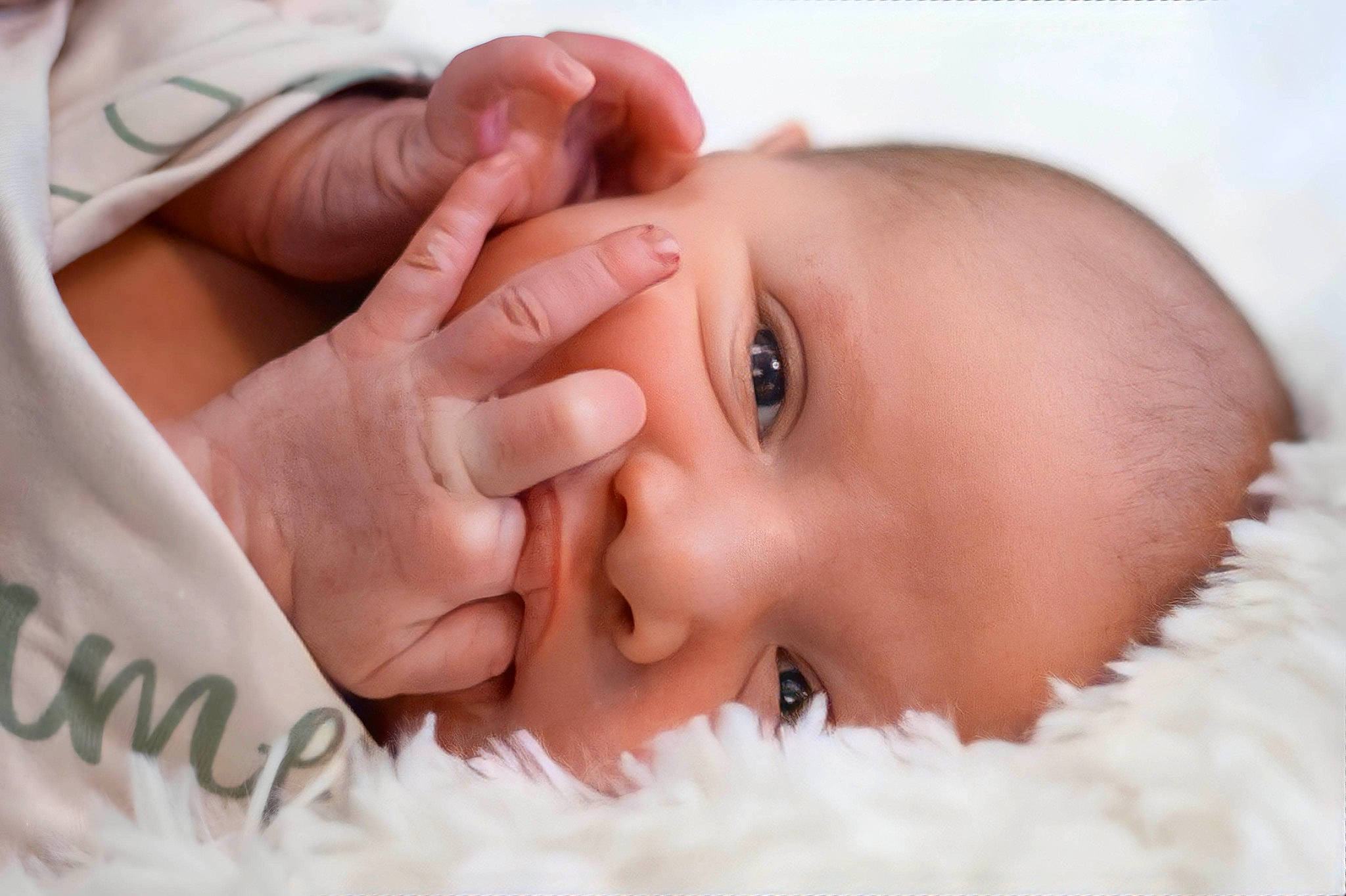 Riley is registered to the contest to win money with this photo: baby, cheek, chin, ear, eye, eyebrow, eyelash, finger, gesture, hand, happy, iris, lip, mouth, muscle, neck, nose, person, skin, smile