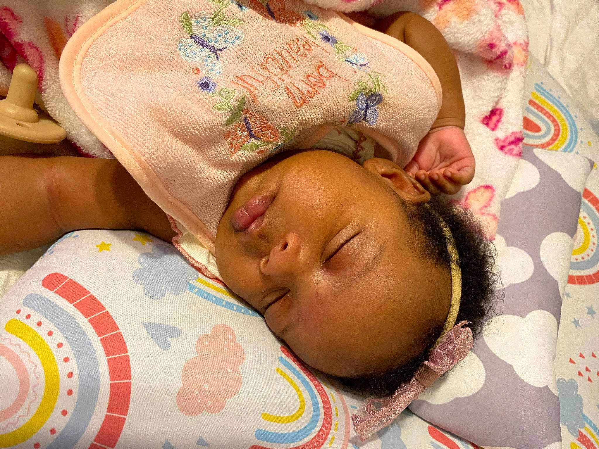 Jupiter is registered to the contest to win money with this photo: baby, baby_products, baby_sleeping, baby_toddler_clothing, bedtime, cheek, chest, child, comfort, eyelash, finger, hand, happy, head, human_body, linens, pattern, person, product, skin