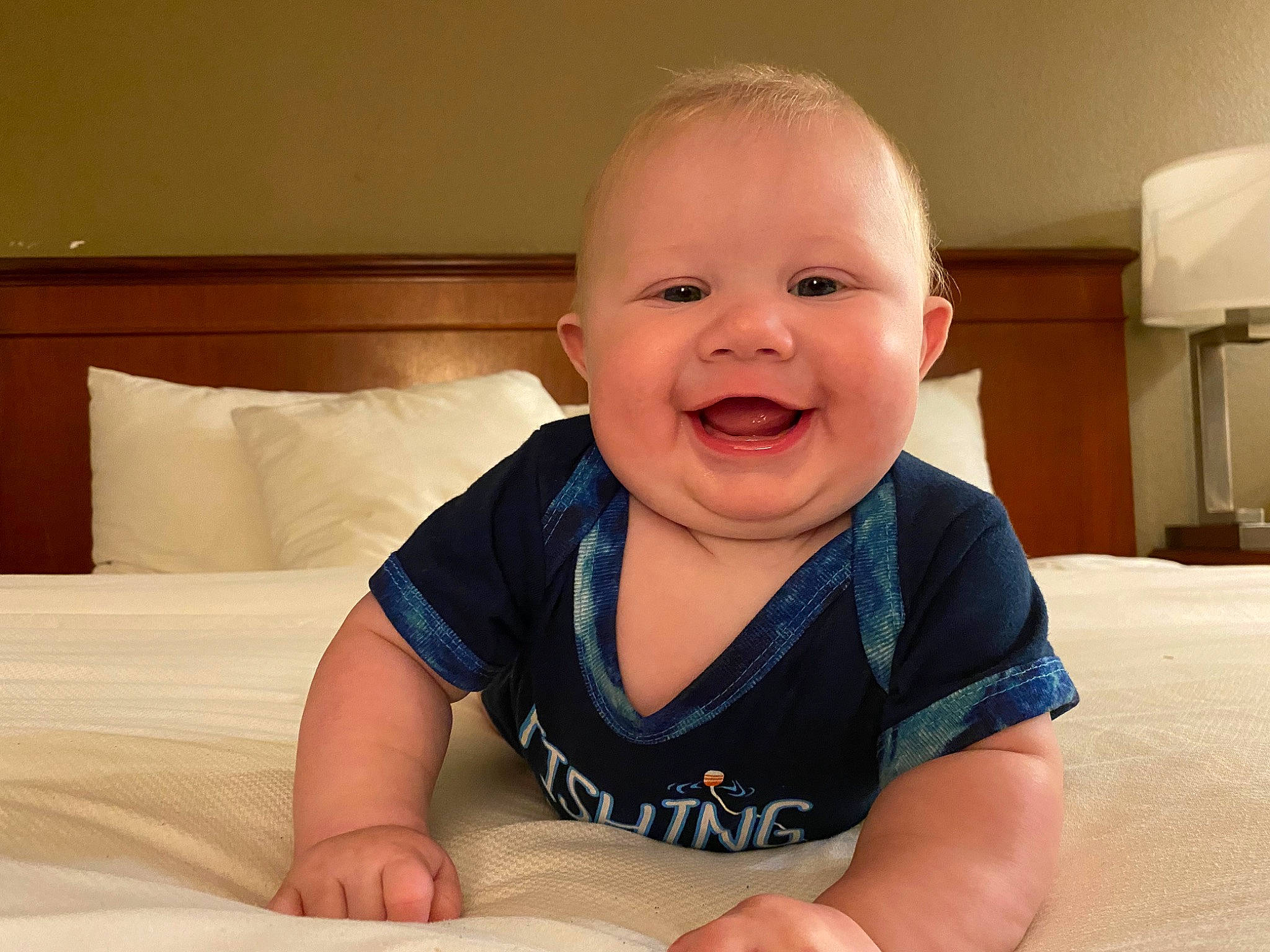 Asia is registered to the contest to win money with this photo: arm, baby, baby_toddler_clothing, cheek, chin, comfort, eye, facial_expression, finger, head, human_body, iris, joy, mouth, nose, person, skin, sleeve, smile, standing