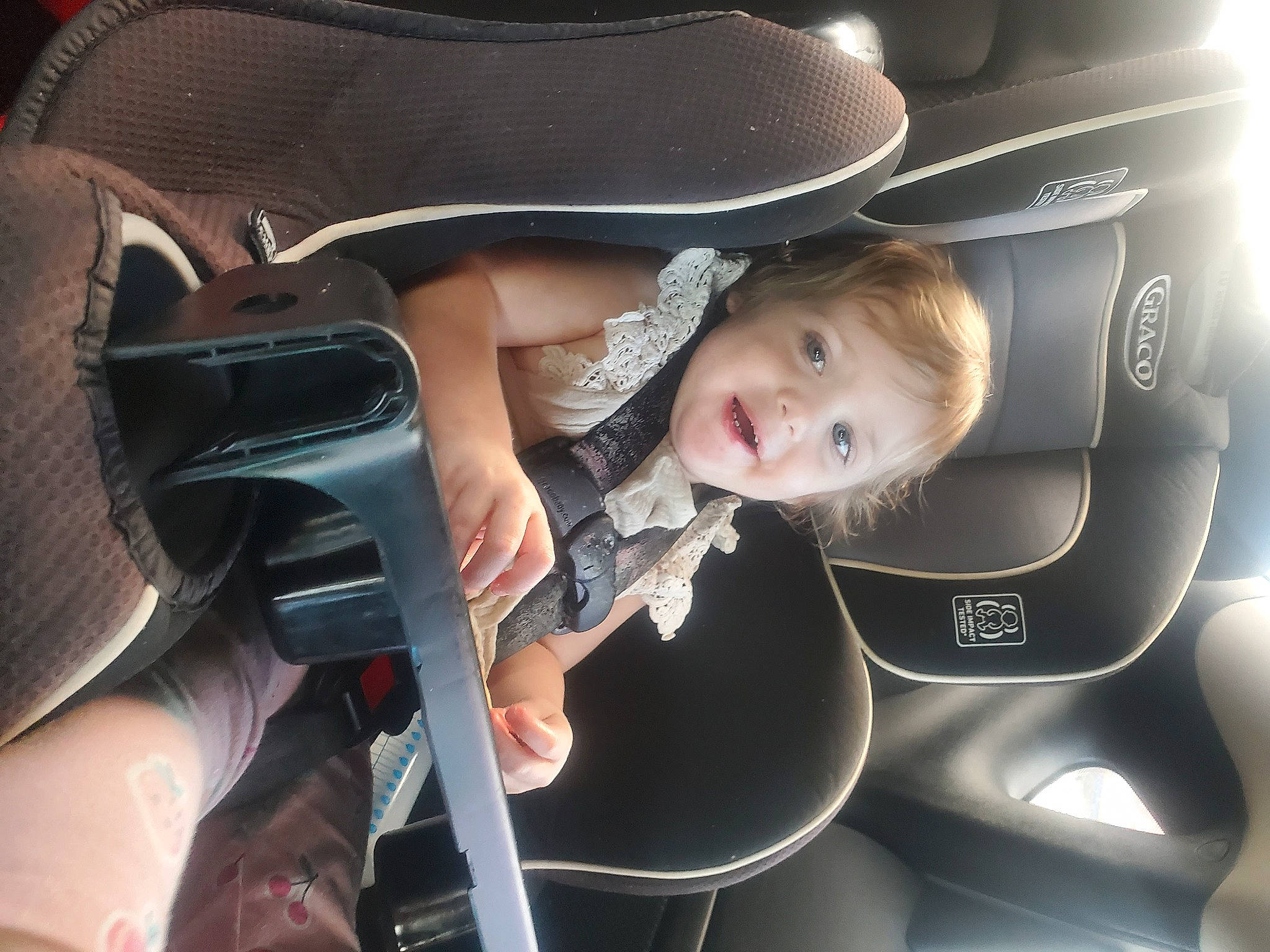 Lilianna joined the competition — help win amazing prizes! auto_part, automotive_design, automotive_exterior, automotive_lighting, automotive_wheel_system, car, car_seat, car_seat_cover, comfort, flash_photography, gesture, motor_vehicle, person, personal_luxury_car, seat_belt, steering_part, steering_wheel, toddler, vehicle, vehicle_door