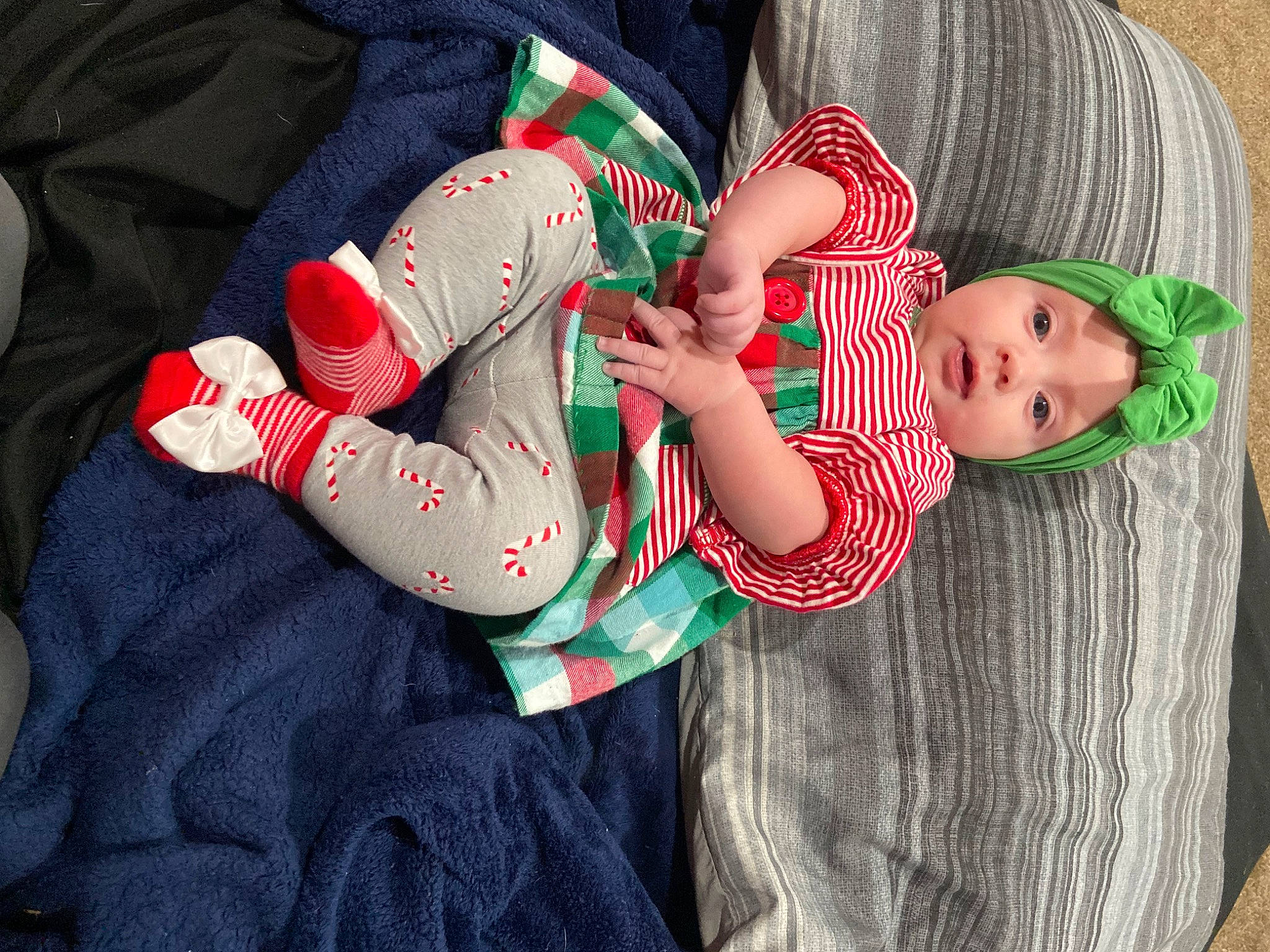 Malaya joined the competition — help win amazing prizes! baby, baby_toddler_clothing, comfort, dress, eye, finger, grass, hand, happy, headwear, human_body, human_leg, knee, lap, leg, person, plant, sleeve, sock, thigh