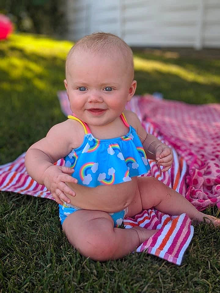 Embri joined the competition — help win amazing prizes! baby, baby_products, baby_toddler_clothing, child, design, dress, grass, head, joy, pattern, people, person, pink, plant, play, product, sitting, skin, summer, toddler