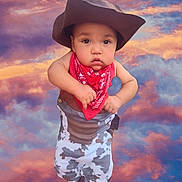 Journey joined the competition — help win amazing prizes! baby, infant, cowboy_hat, bandana, costume, cowboy_costume, boots, portrait, cute, chubby_cheeks, hands, eyes, background_clouds, sunset_sky, studio_edit, child, dress_up, fashion, colorful, full_body