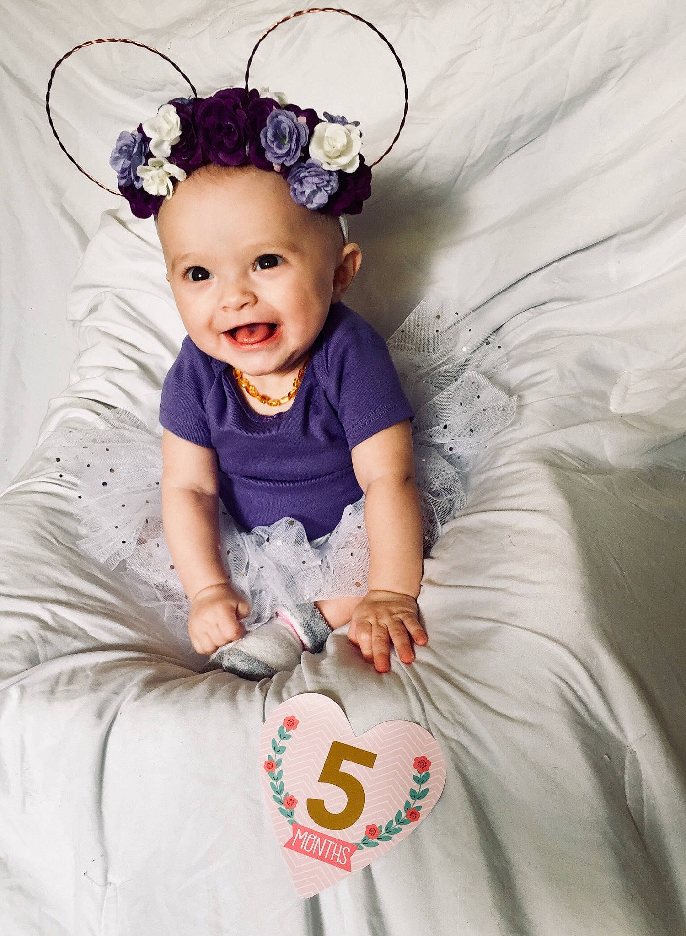 Juliet is registered to the contest to win money with this photo: child, costume, girl, hair_accessory, headgear, headpiece, infant, joy, person, product, toddler