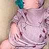 Aurora joined the competition — help win amazing prizes! baby, infant, child, portrait, sitting, pacifier, headband, pink_outfit, floral_pattern, dress, romper, cushion, sofa, indoor, closeup, face, hand, legs, socks, sleepy
