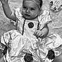 baby, black_and_white, celebration, child, costume, crown, cute, dress, fabric, flower, happy, infant, person, portrait, royalty, sitting, smiling, soft_texture, tutu, young