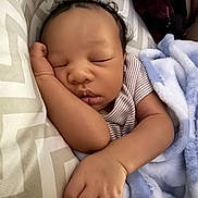 Zymir joined the competition — help win amazing prizes! baby, sleeping, blanket, soft, arm, hand, face, infant, peaceful, rest, comfort, striped_clothing, curly_hair, bed, pillow, closeup, skin, cute, relaxation, child