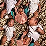 Mulanni joined the competition — help win amazing prizes! baby, infant, collage, leopard_print, onesie, pink_hooded_jacket, cute, expression, tongue_out, lying_down, blanket, portrait, child, smiling, playful, closeup, adorable, cozy, multiple_faces, baby_photography