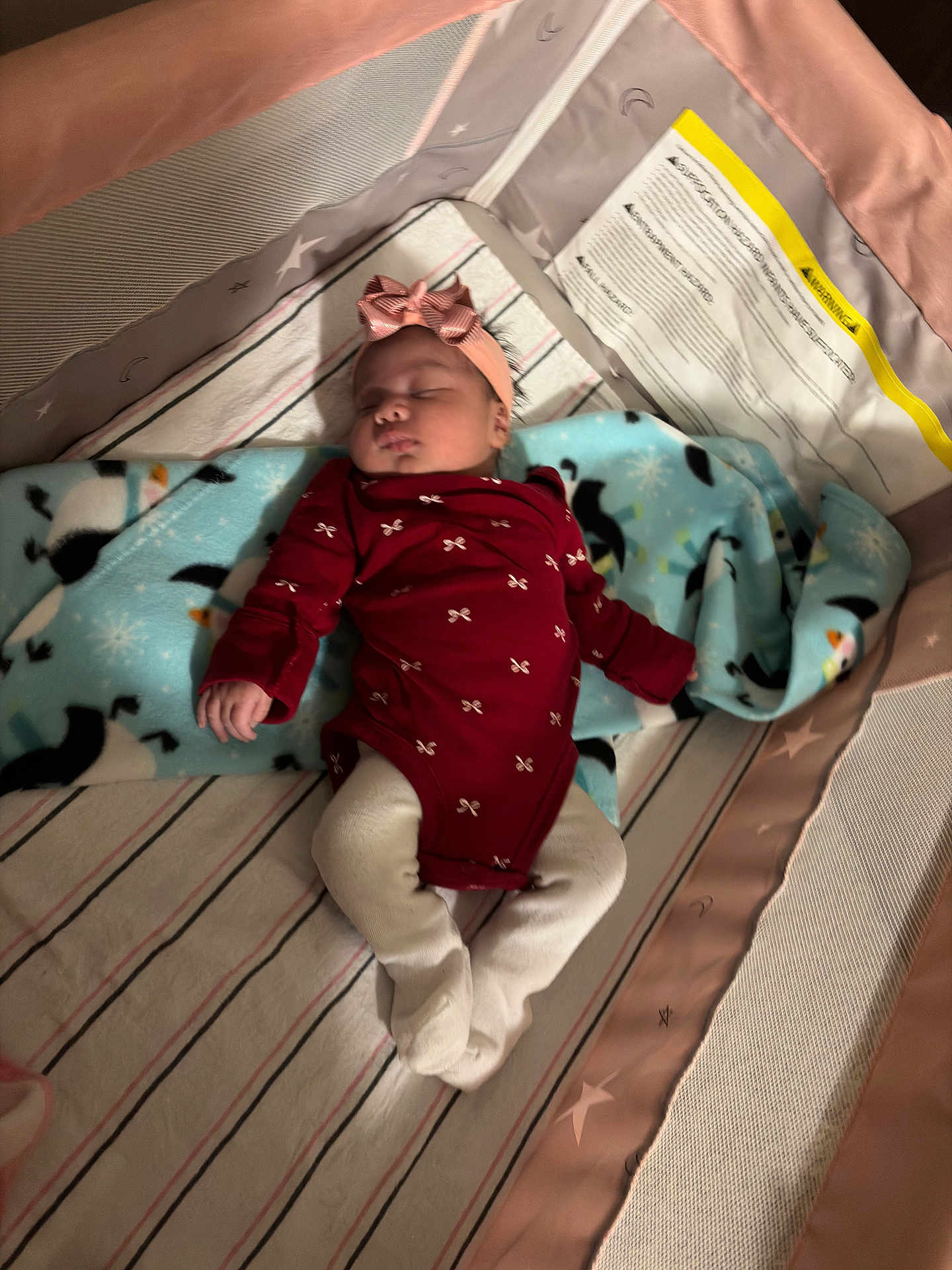 Merry joined the competition — help win amazing prizes! baby, sleeping, onesie, headband, blanket, playpen, tights, infant, cute, indoor, striped_blanket, blue_blanket, pink_bow, cozy, child, newborn, soft_lighting, resting, peaceful, clothing