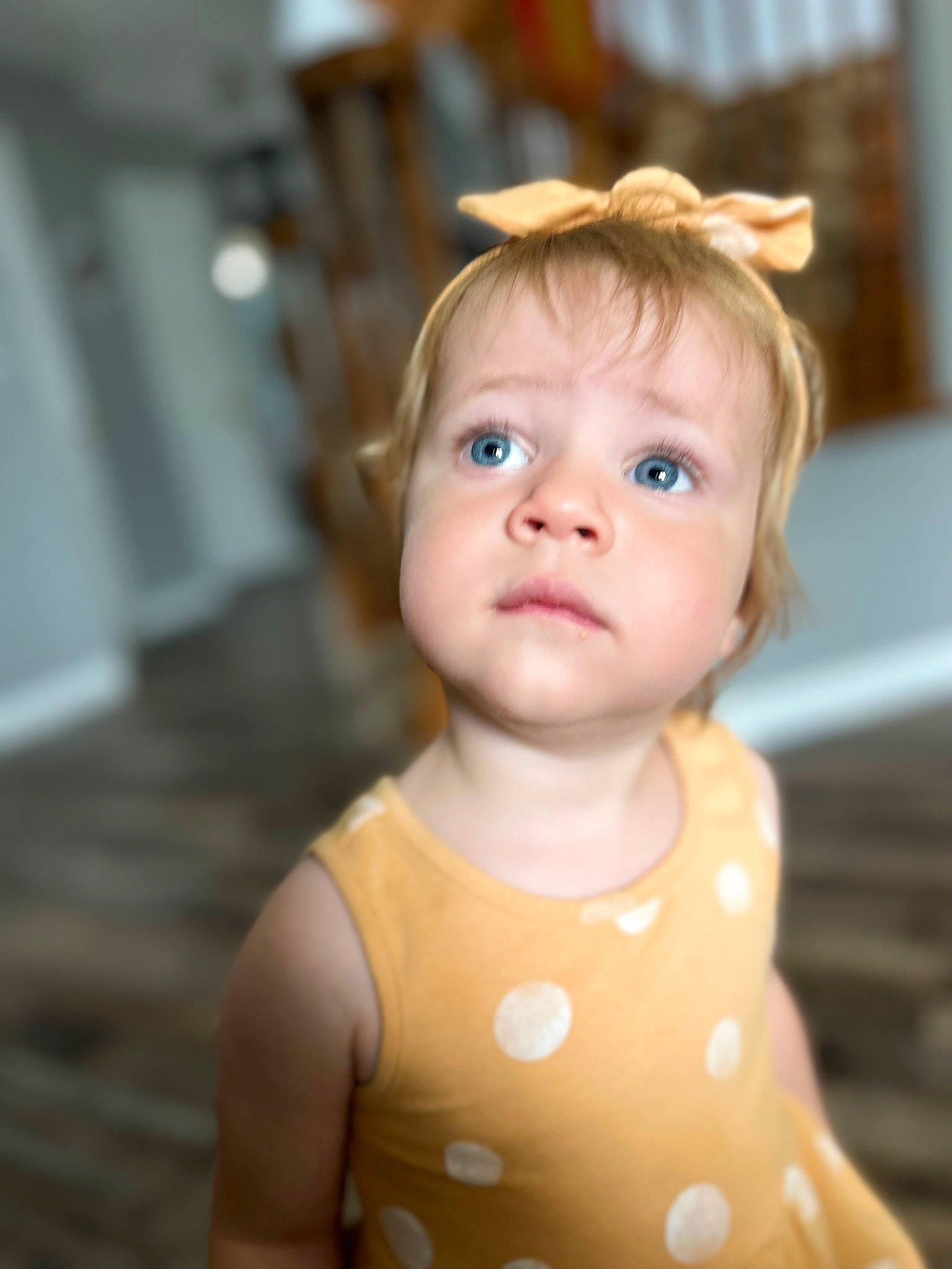 Gracie is registered to the contest to win money with this photo: baby, baby_toddler_clothing, blond, cheek, child, chin, day_dress, dress, eyelash, facial_expression, fun, happy, iris, lip, neck, pattern, person, shoulder, skin, sleeve